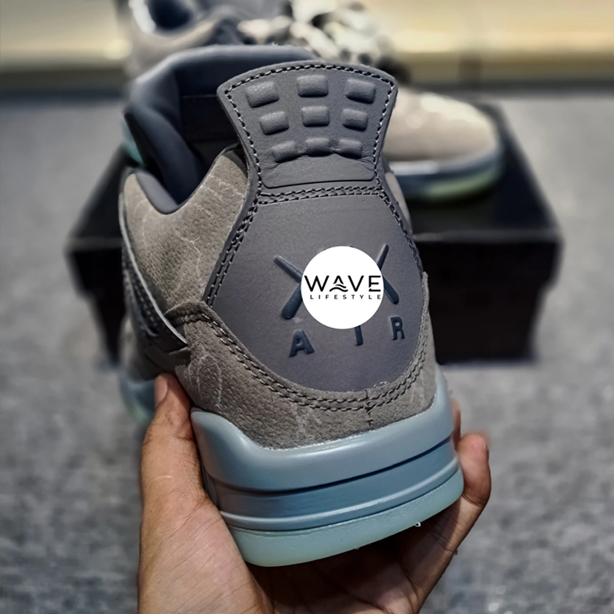 Jordan 4 Retro x KAWS Cool Grey