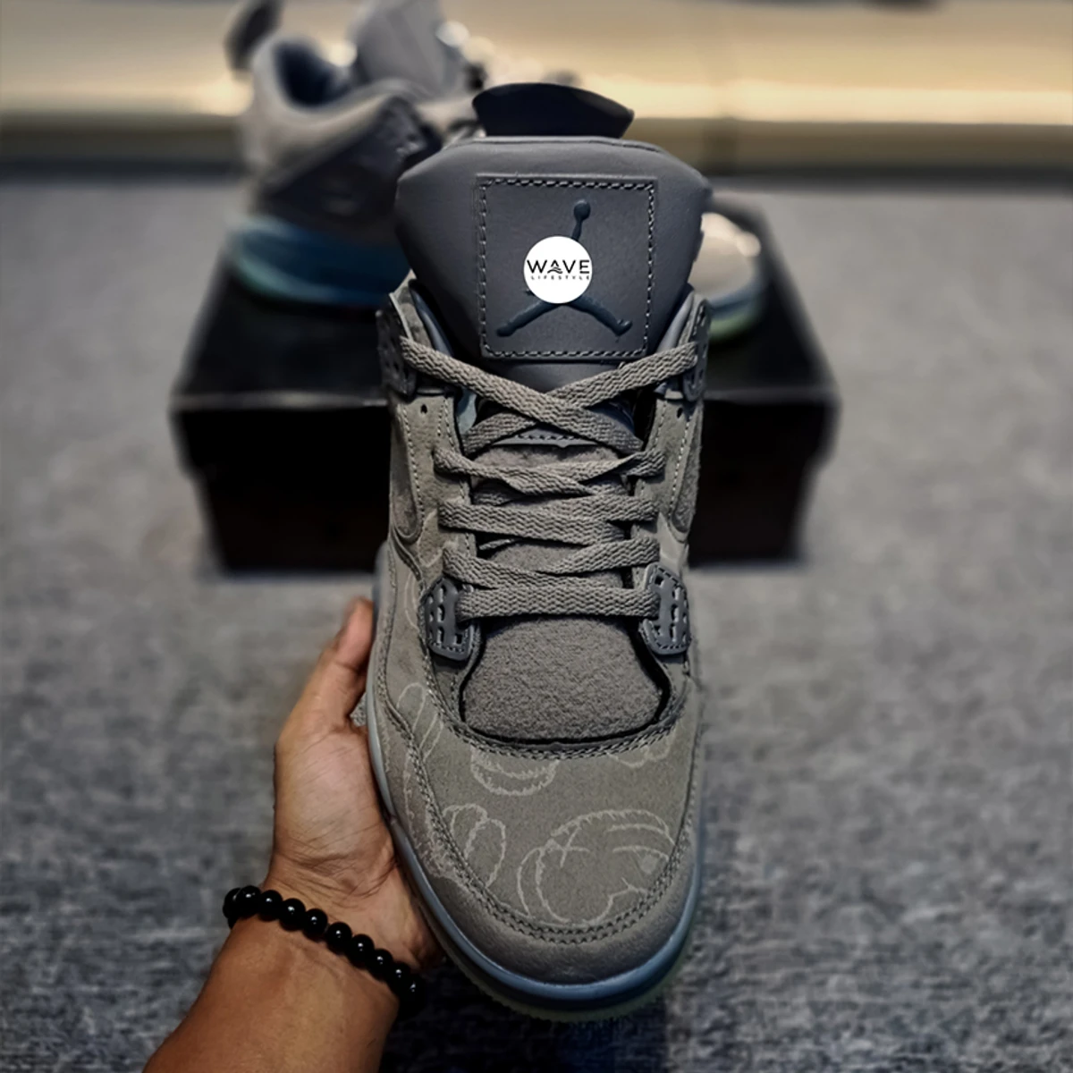 Jordan 4 Retro x KAWS Cool Grey